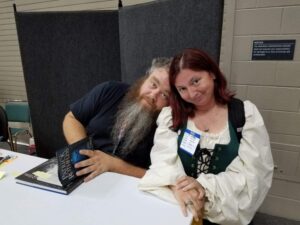 A photo of myself with Patrick Rothfuss from Gen Con 2017.
