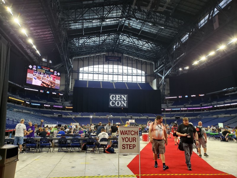 Lucas Oil Stadium, entering the football field where, instead of football, boardgames are being played.