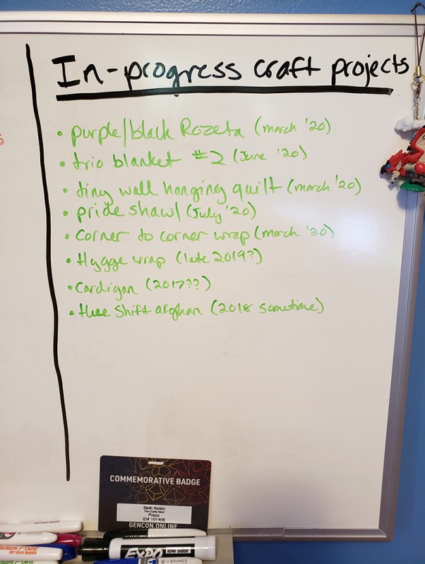 A whiteboard with a list of all the craft projects I'm working on - some date all the way back to 2017.