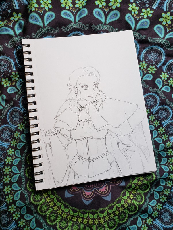 Photo of a sketchbook, open to a pencil sketch of Ëlinyr.
